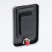 The black switch with a red button on a white background.