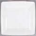 A white square Tuxton Concentrix china plate with a white square design.