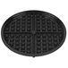 A black non-stick bottom grid with square shapes.