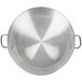 A close-up of a circular aluminum pan with handles.
