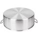 A silver round metal pan with a circular design.