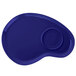 A cobalt blue melamine plate with a round section in the middle.