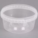 A 12 oz clear plastic tamper evident deli container with a lid.