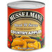 A #10 can of Musselman's Heat N Serve Spiced Country Apples on a table.