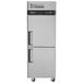 A white Turbo Air M3 Series reach-in freezer with black handles.
