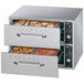 A Hatco freestanding drawer warmer with two drawers holding trays of food.