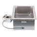 A stainless steel APW Wyott drop-in food warmer with a drain.