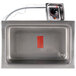 An APW Wyott stainless steel drop-in food warmer with a drain.