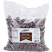 A white bag of DaVinci Gourmet Milk Chocolate Covered Espresso Beans with a label of a chocolate bean.
