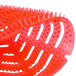 A red Lavex Cherry Scent deodorized urinal screen with small spikes on it.