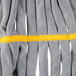 A yellow and gray striped Unger SmartColor microfiber tube mop head.