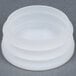 A white plastic bowl with three rings on the bottom.