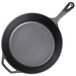 A black round Lodge cast iron skillet with a handle.