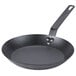 A Lodge CRS10 carbon steel fry pan with a handle.