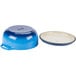 A Caribbean blue enameled cast iron bowl with a lid on a white background.