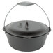 A Lodge black cast iron dutch oven with a metal handle and lid.