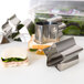 A sandwich with meat and lettuce cut into fancy shapes using Ateco stainless steel cookie cutters.
