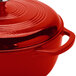 A red Lodge enameled cast iron dutch oven with a lid.