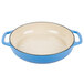A Caribbean blue enameled cast iron casserole dish with handles and a cover.