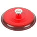 The lid for a Lodge Island Spice Red Enameled Cast Iron Dutch Oven with a silver knob.