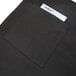 A black apron with a black pocket and white card inside.