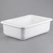 A white rectangular plastic container with a lid.