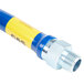 A blue and yellow gas connector hose with metal fittings.