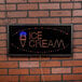 An Aarco LED sign that says "Ice Cream" on a white background with lights.