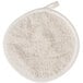 A white terry cloth round pot holder with a white ribbon.