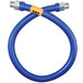 A close-up of a blue Dormont stainless steel flexible gas hose with yellow label.