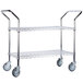 A silver chrome metal cart with black wheels and two shelves.