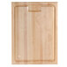 A Nemco wooden carving board with a handle.