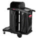 A black Rubbermaid janitor cart with doors open.