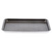 A grey metal rectangular tray with holes.