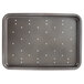 A black rectangular tray with white dots and holes in it.