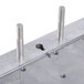 A metal plate with screws and bolts for a Nemco Countertop Rethermalizer.
