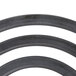 A close-up of a Nemco replacement black rubber ring.