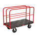 A black Rubbermaid cart with red metal rails.