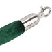 A green velvet rope with satin ends.