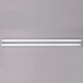 Two white fluorescent tubes on a gray surface.