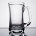 A Libbey clear glass mug with a handle.