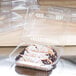 A close-up of a clear plastic container with food inside.