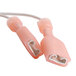 A pair of pink plastic cables with white connectors attached to a metal object.