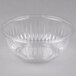 A clear plastic bowl with a pattern on it.