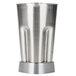A close-up of a Waring stainless steel blender jar with a blending assembly.