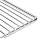 A stainless steel Cecilware wire rack with four bars.