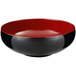 A white melamine bowl with black and red designs.
