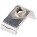 A metal strain relief clamp with a nut on it.