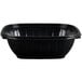 A black Dart plastic bowl with a black lid.