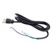 A black electrical cord with white and green wires.